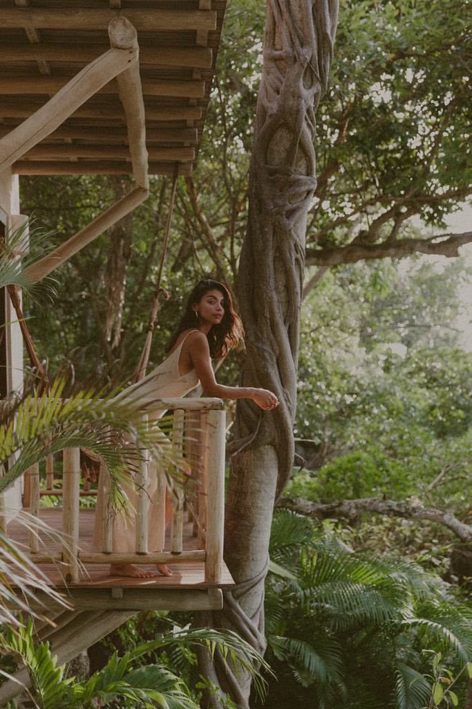 Hello Sunday girl in treehouse in the jungle